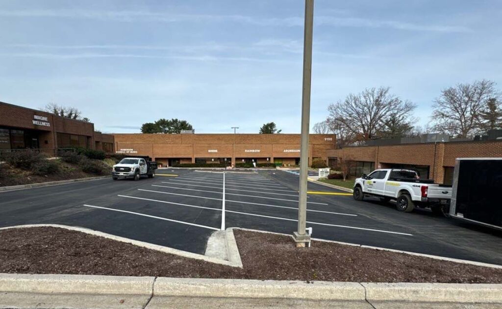 Helmsman Paving seal coating a parking lot in Maryland